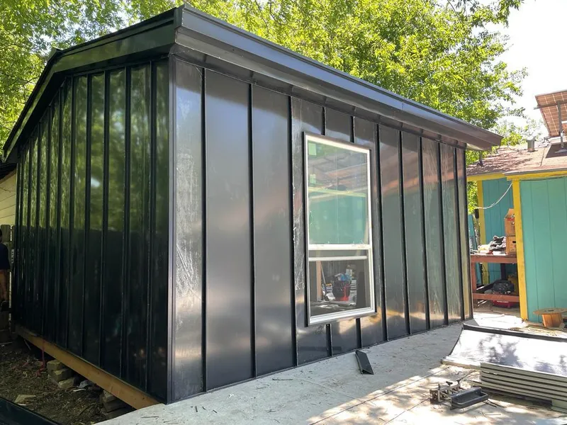 Black standing seam metal wall panels for Roof Inspection in Alamo